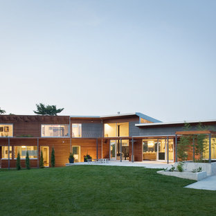 Example of a minimalist two-story exterior home design in Kansas City