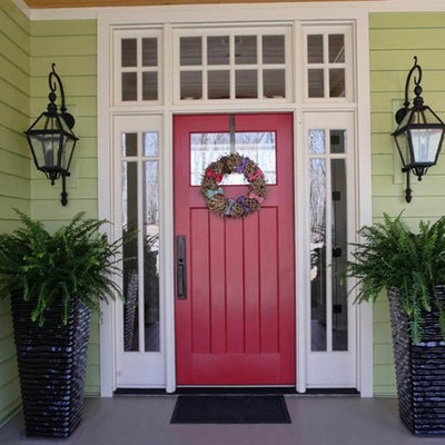 Inspiration for a craftsman green exterior home remodel in Raleigh
