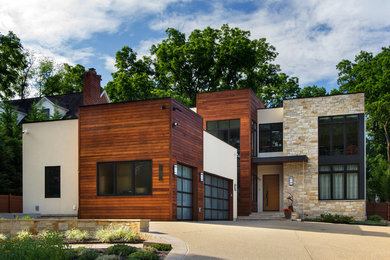 Example of a trendy two-story mixed siding exterior home design in DC Metro