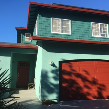 Blue-Green Exterior with Red Garage