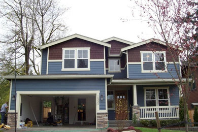 Blue two-story exterior home photo in Seattle