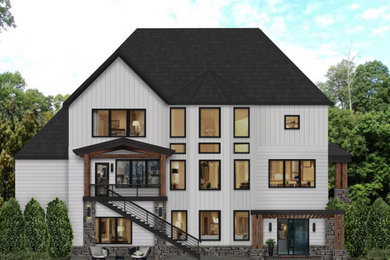 Large contemporary white three-story mixed siding and board and batten house exterior idea in Atlanta with a black roof