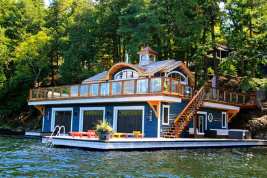 Стильный дизайн: двухэтажный, синий дом в морском стиле - последний тренд