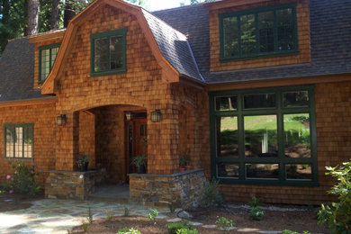 Example of a huge mountain style brown two-story wood exterior home design in San Francisco