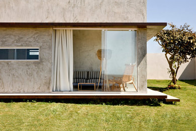 Photo of a beige modern house exterior in Other.