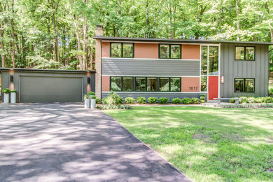 Example of a 1960s exterior home design in Grand Rapids
