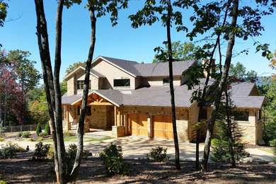 Mid-sized craftsman brown two-story brick gable roof idea in Atlanta