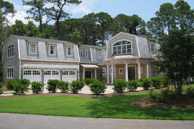 Inspiration for a large gray two-story wood exterior home remodel in Atlanta