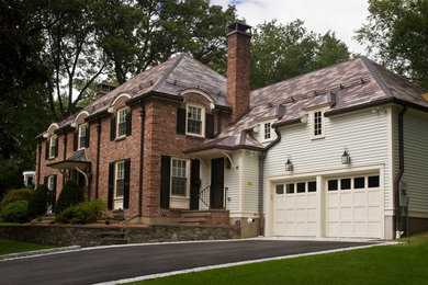 Mid-sized traditional three-story brick exterior home idea in Boston