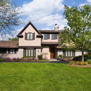 Brick, Stone and Cedar Traditional Style House in Northbrook