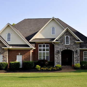 Brick, Stone, and Dryvit Exterior in Traditional Colors