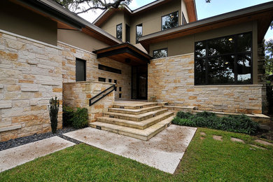 Example of a large trendy exterior home design in Austin