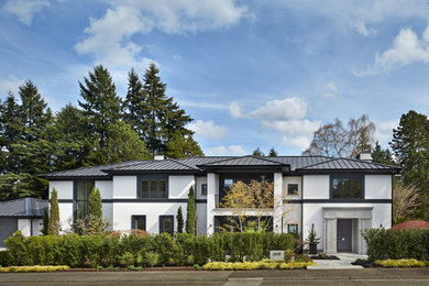 Example of a transitional exterior home design in Seattle