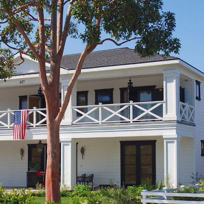Elegant wood exterior home photo in Orange County