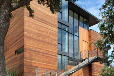 Photo of a contemporary house exterior in San Francisco with wood cladding.