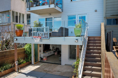Example of a mid-sized trendy gray exterior home design in San Francisco