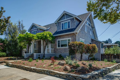 Inspiration for a mid-sized craftsman blue two-story mixed siding gable roof remodel in San Francisco