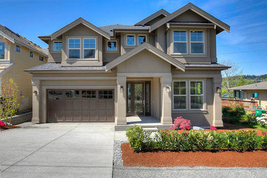 Example of a two-story exterior home design in Seattle
