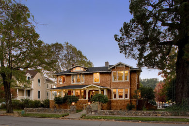 Example of a large arts and crafts brown two-story wood exterior home design in San Francisco with a shingle roof