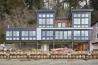 シアトルにある高級なコンテンポラリースタイルのおしゃれな家の外観 (混合材サイディング) の写真