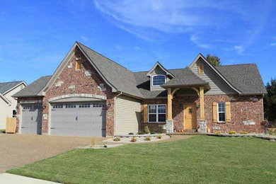 Trendy gray two-story brick exterior home photo in St Louis