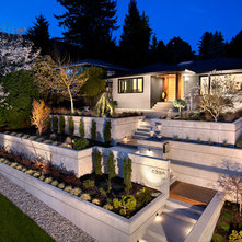 Midcentury Exterior by CCI Renovations