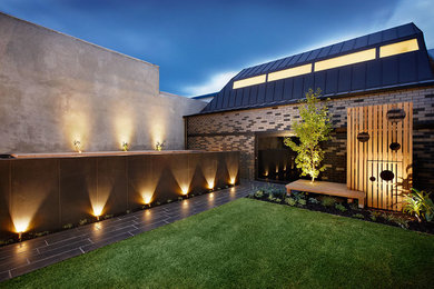 Example of an exterior home design in Melbourne