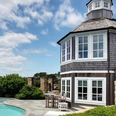 Inspiration for a coastal wood exterior home remodel in Boston
