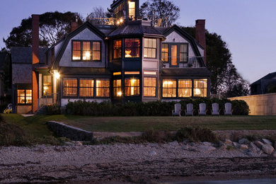 Coastal brown two-story wood house exterior idea in Boston with a gambrel roof and a shingle roof