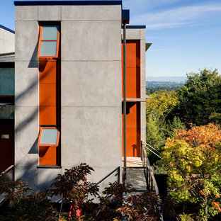 Design ideas for a contemporary concrete exterior in Seattle.