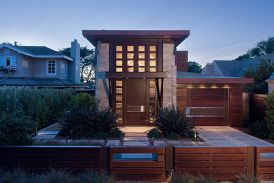 Mid-sized trendy brown two-story mixed siding exterior home photo in San Francisco with a hip roof