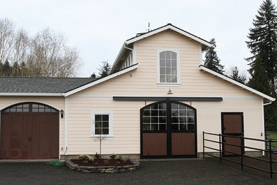 Example of a classic one-story concrete fiberboard exterior home design in Portland