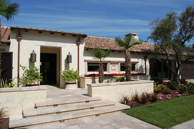 Example of a tuscan exterior home design in Sacramento
