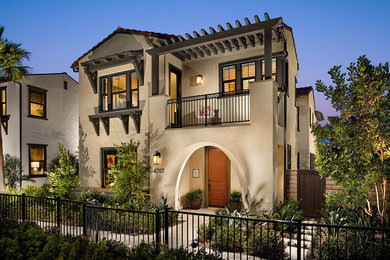 Inspiration for a southwestern two-story exterior home remodel in San Diego