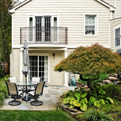 Elegant wood exterior home photo in DC Metro