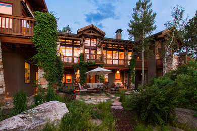 Design ideas for a rustic house exterior in Denver.