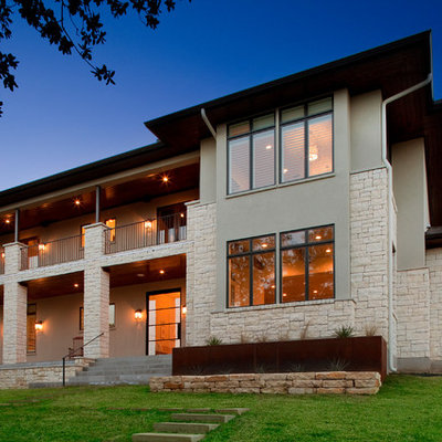 Example of a trendy stone exterior home design in Austin