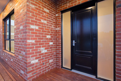 Inspiration for a large traditional two floor brick detached house in Melbourne.