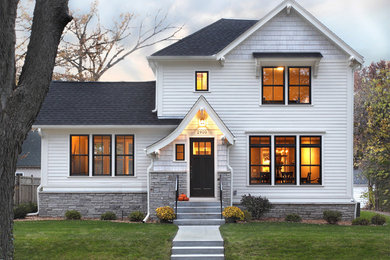 Mid-sized traditional white two-story wood exterior home idea in Minneapolis