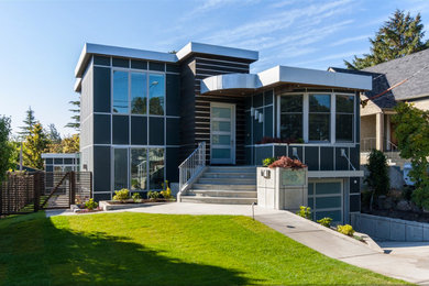 Example of a trendy two-story exterior home design in Vancouver