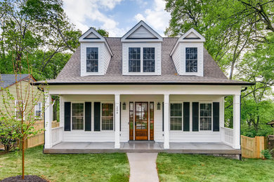 Inspiration for a transitional white two-story exterior home remodel in Nashville