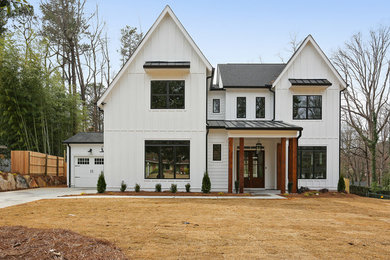 Example of a cottage exterior home design in Atlanta