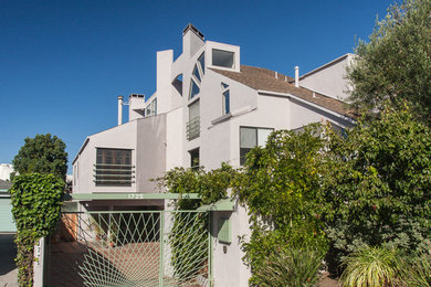 Contemporary beige exterior home idea in Austin