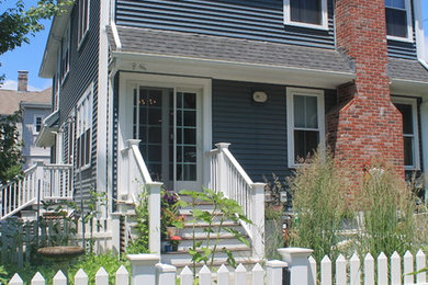 Blue two-story house exterior photo in Boston
