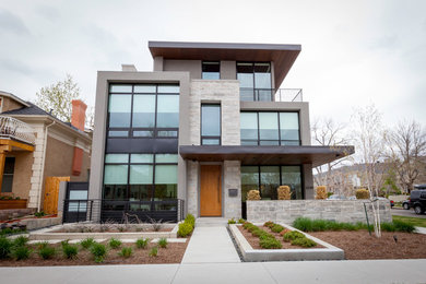 Large trendy gray three-story mixed siding exterior home photo in Denver
