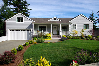 Large traditional gray three-story mixed siding house exterior idea in Seattle with a shingle roof