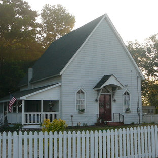 Inspiration for a huge farmhouse white two-story mixed siding exterior home remodel in Wilmington