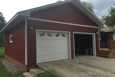 Inspiration for a large timeless garage remodel in Other