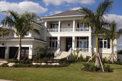Example of a large beach style exterior home design in Other