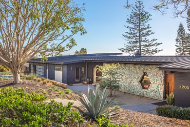 Inspiration for a midcentury house exterior in San Diego.